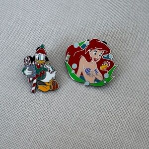 One supercharge Disney Character Enamel pin and one regular